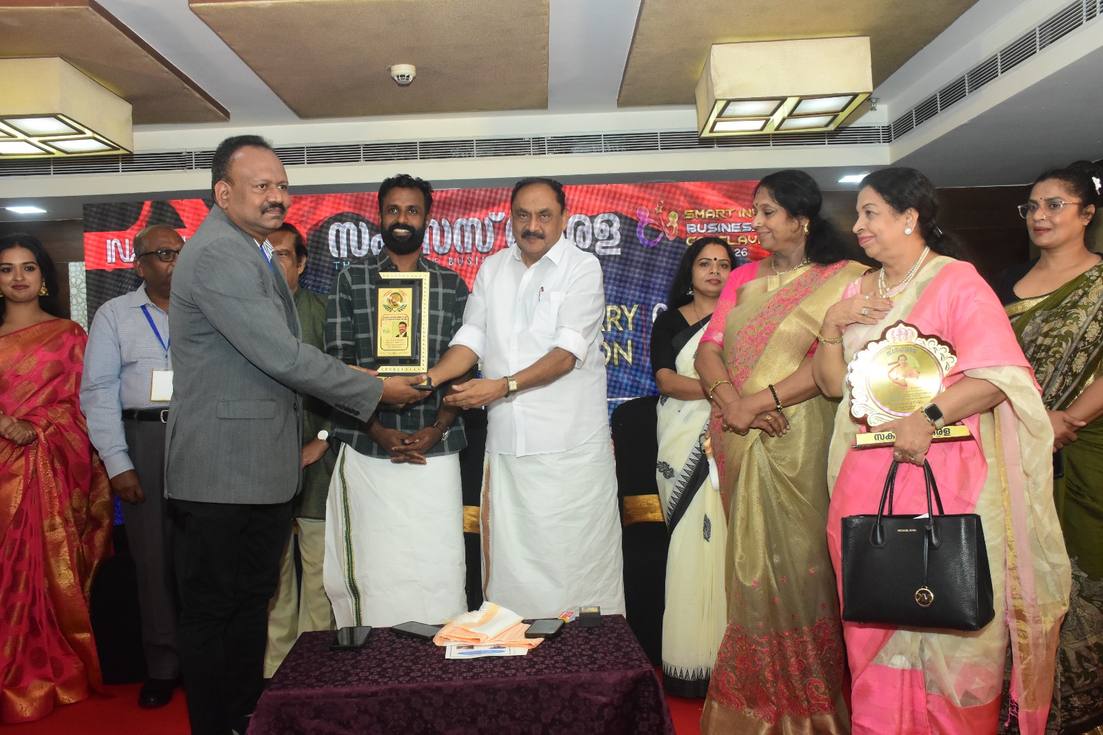 Dr. Vijayakumar receiving the Best Ayurveda Hospital Award 2026