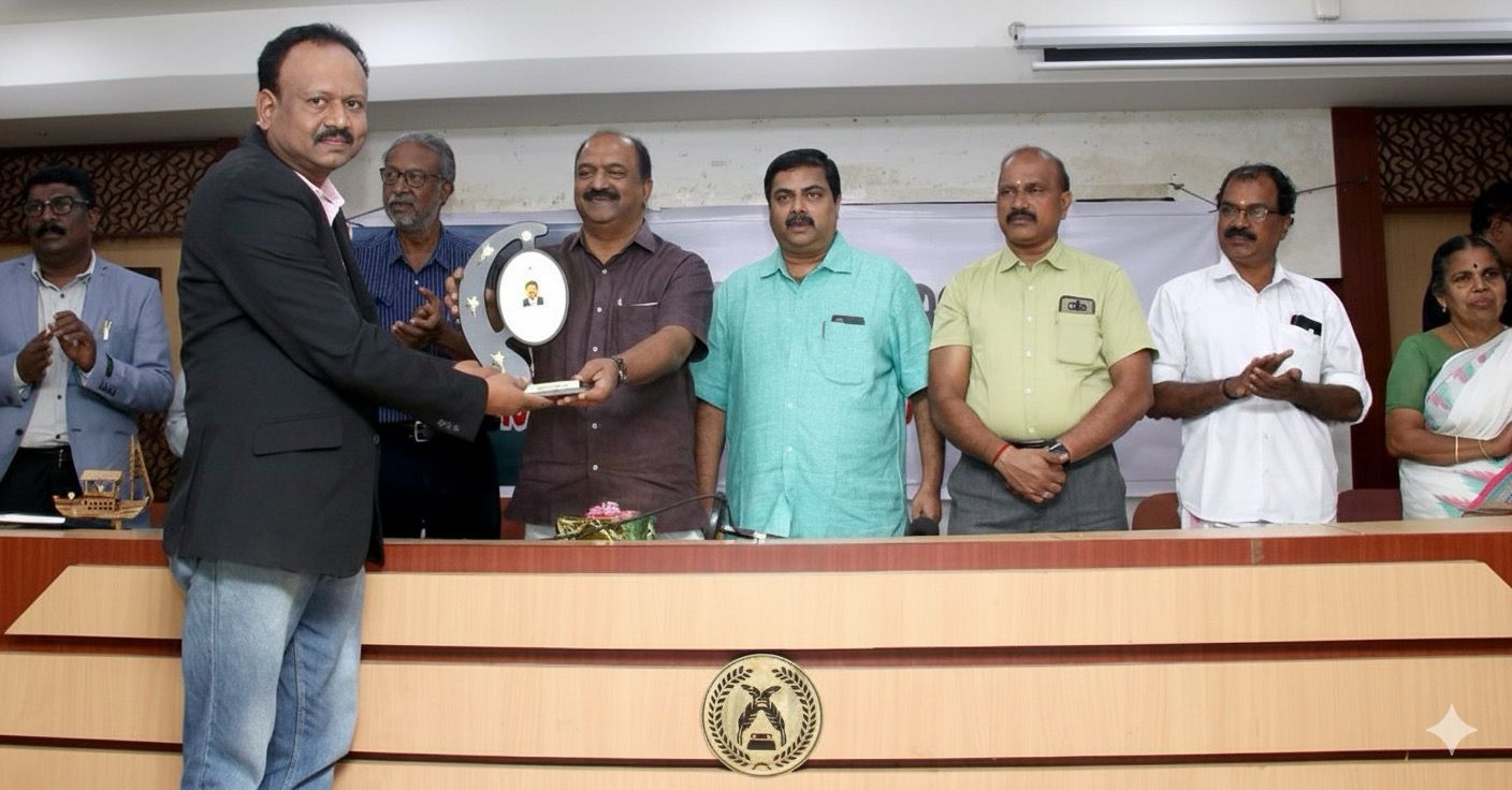 Dr Vijayakumar receiving Excellence Award from Kerala Finance Minister Sri. Balagopal